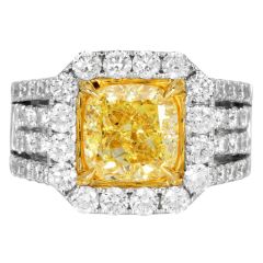 GIA 6.70 carats Fancy Yellow Cushion Diamond 18K Gold Halo Engagement Ring